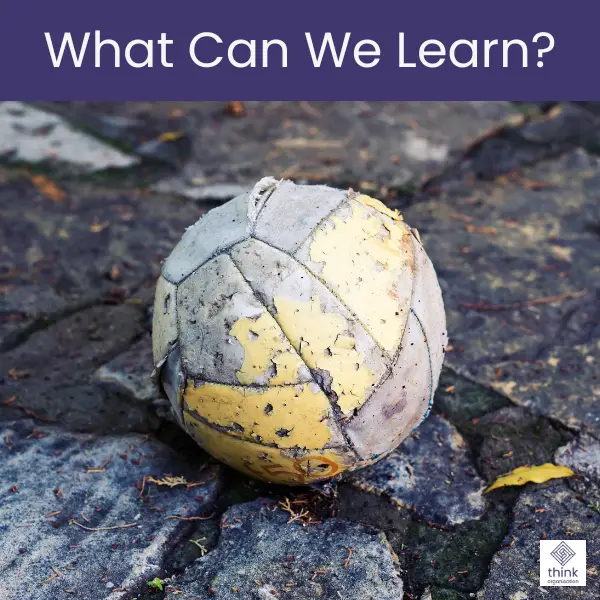 Image of old battered football on a muddy rubbish strewn floor with the words what can we learn above.
